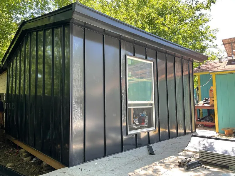 Black standing seam metal wall panels for Metal Roof Installation in Cornelius